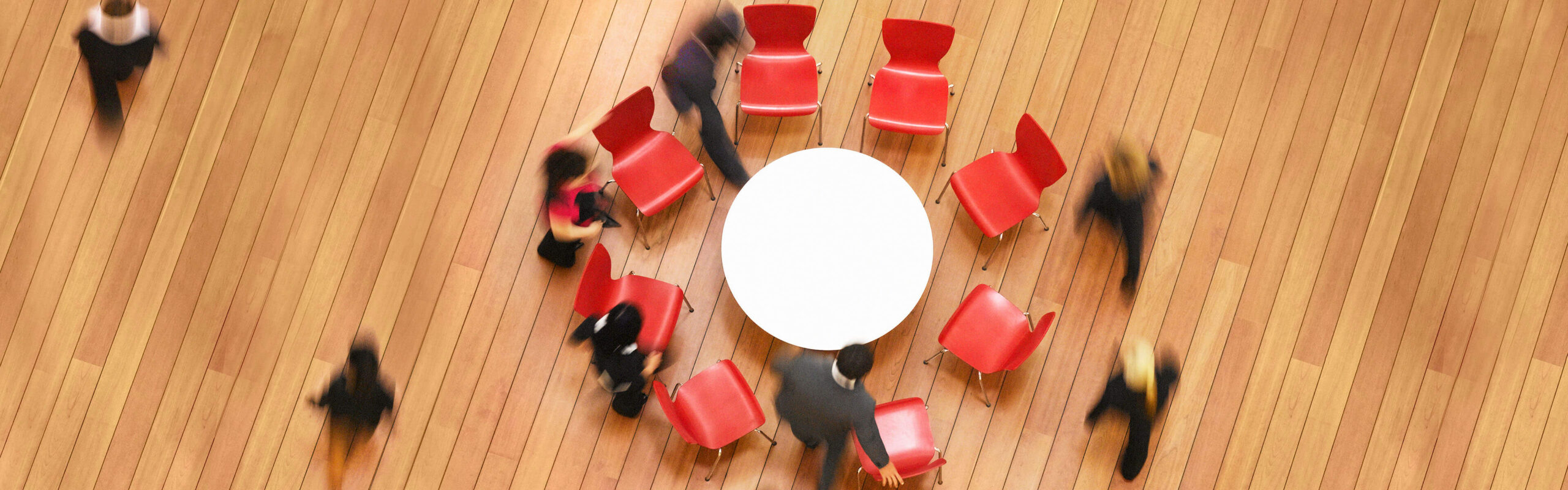 Red office chairs in circle